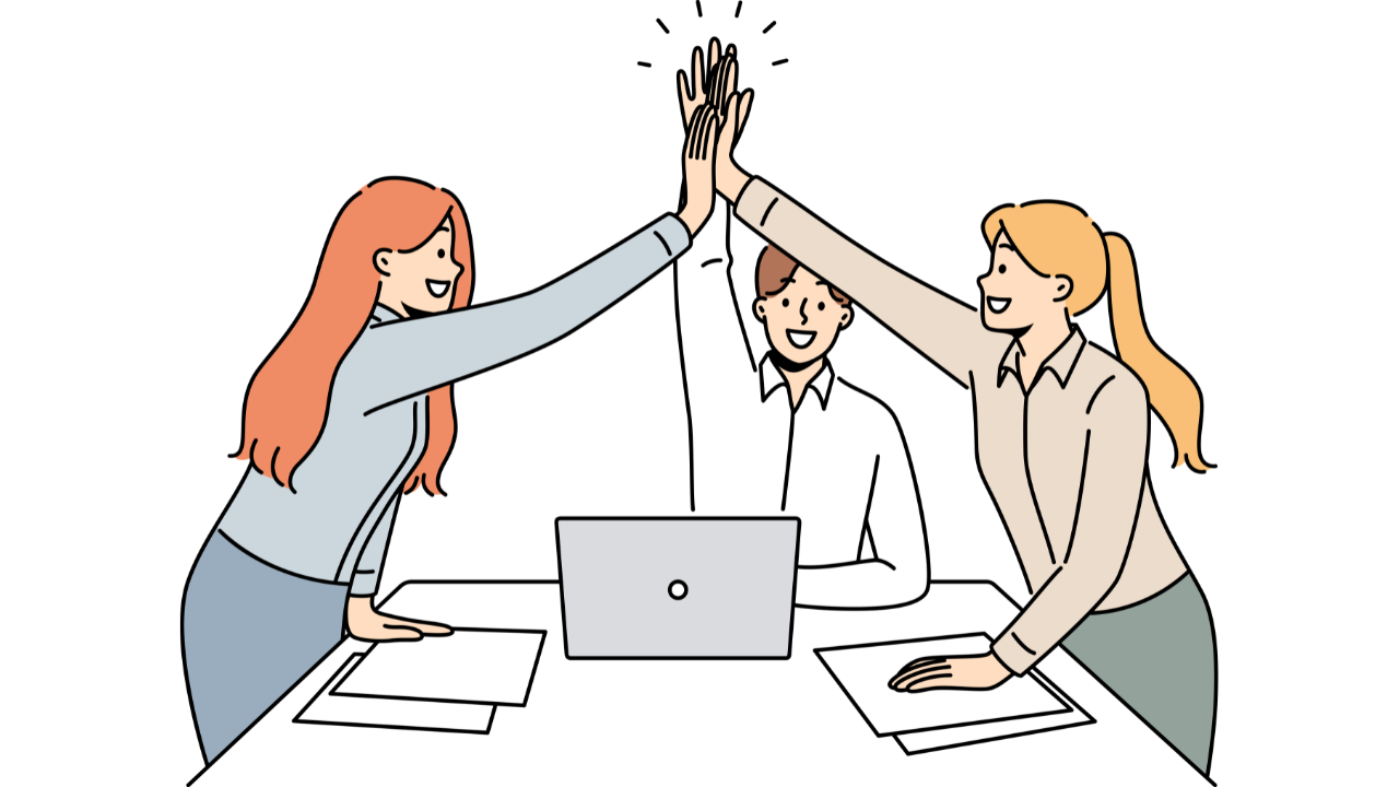 Happy employees collaborating in a positive work environment.