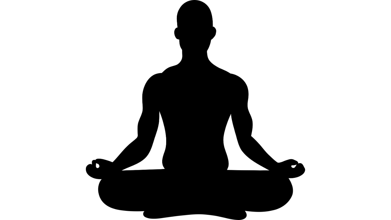 A serene image of a person meditating on a balcony. 